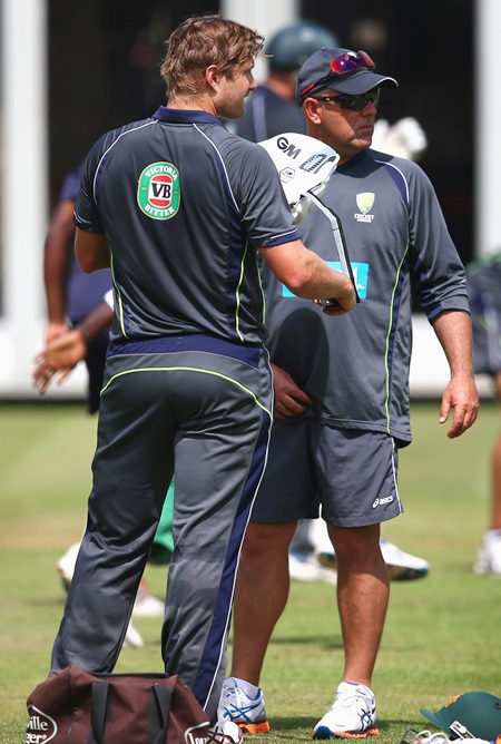 Shane Watson and coach Darren Lehmann talk during Australia's nets session at Lord's on Wednesday