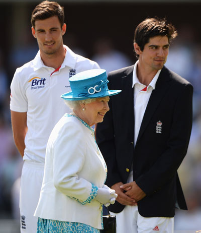 Queen Elizabeth II smiles after meeting England captain Alastair Cook (right) and Steven Finn prior to day one of the second Ashes Test
