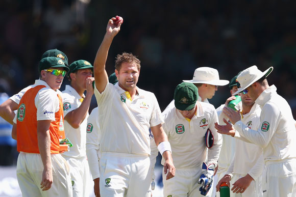 Ryan Harris of Australia celebrates after taking his fifth wicket