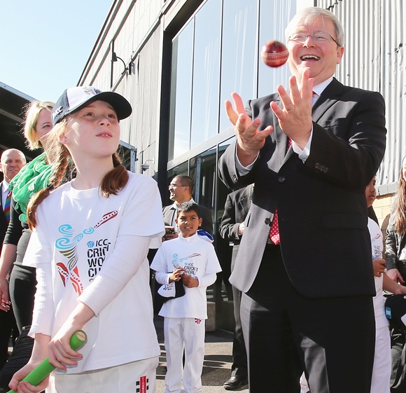 Australian Prime Minister Kevin Rudd catches a cricket ball