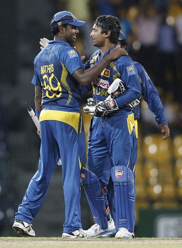 Angelo Mathews and Kumar Sangakkara celebrate the win