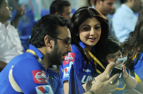 Raj Kundra with Shilpa Shetty and son during an IPL match