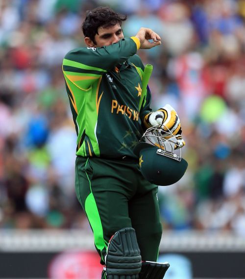 Misbah-ul-Haq walks back at the end of Pakistan's innings