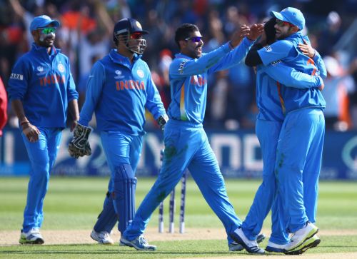 Ravindra Jadeja (C) of India leads the celebrations after a wicket during the Group B ICC Champions Trophy match between India and South Africa at the SWALEC Stadium on June 6, 2013 in Cardiff