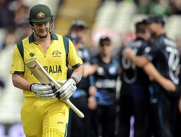 Australia's Shane Watson leaves the field after being dismissed
