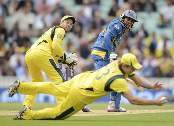 Sri Lanka's Tillakaratne Dilshan is caught by Australia's Shane Watson as Matthew Wade (left) looks on