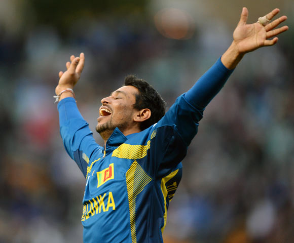 Tillakaratne Dilshan celebrates after taking the final wicket of Clint McKay