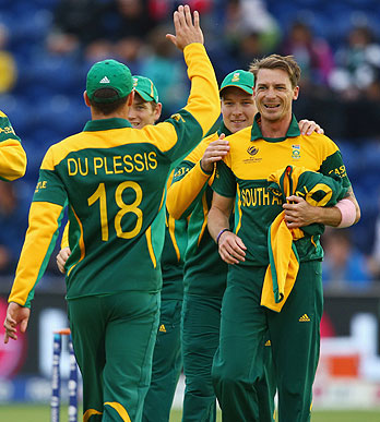Dale Steyn (R) of South Africa accepts the congratulations from teammates