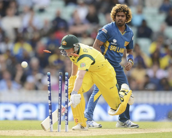 eorge Bailey is run out as Lasith Malinga looks on
