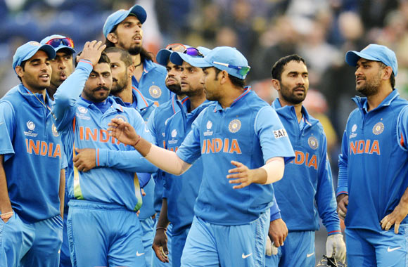 India elect to bowl after rain delays start