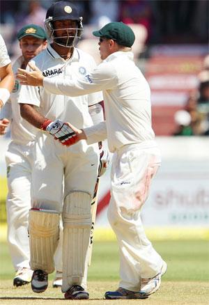 Cheteshwar Pujara is congratulated by David Warner after completing his double century on Monday