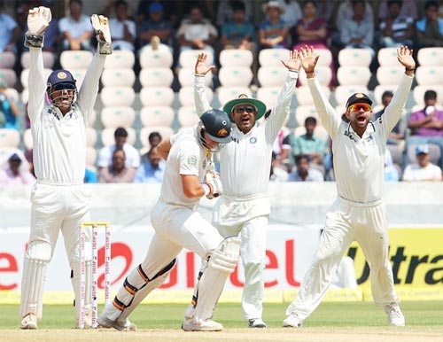 Indian players appeal for the wicket of James Pattinson