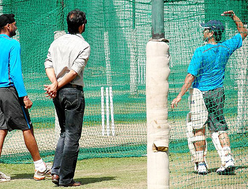 Sachin Tendulkar shares inputs with Harbhajan Singh at the nets on Wednesday