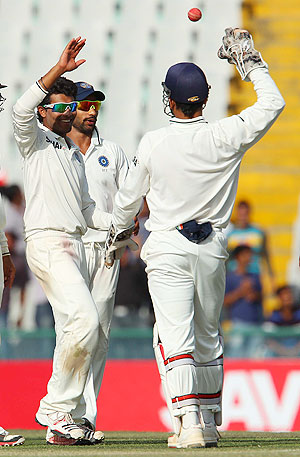 Jadeja is congratulated by teammates after the dismissal of Peter Siddle