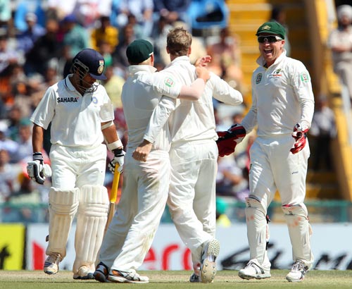 Australian players celebrate after getting the wicket of Sachin Tendulkar