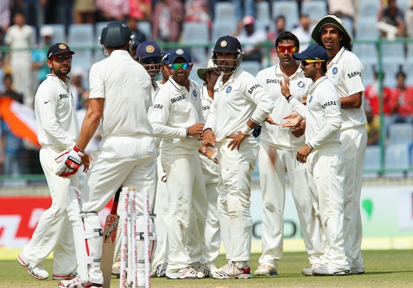 Murali Vijay gestures to Mitchell Johnson to leave the field