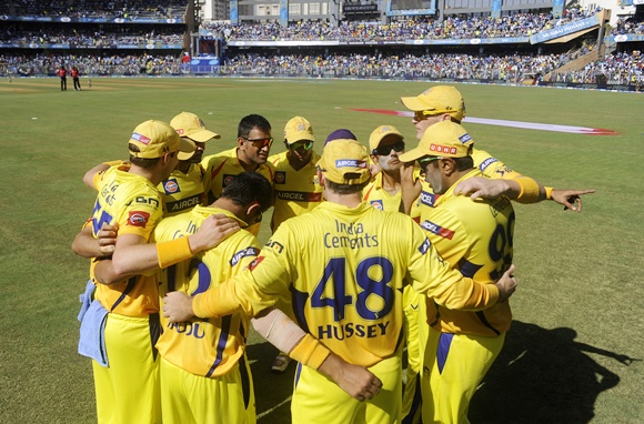 Chennai Super Kings players get into a huddle before the start of play
