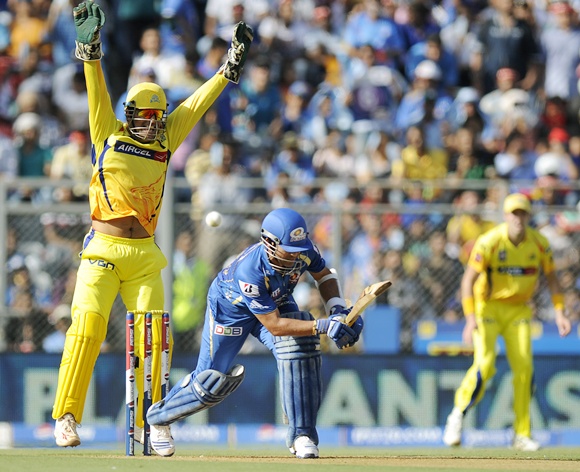 Mahendra Singh Dhoni appeals successfully for the wicket of Sachin Tendulkar