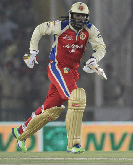 Chris Gayle of the Royal Challengers Bangalore hits over the top for six