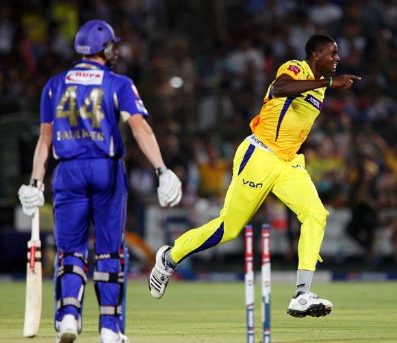 Jason Holder celebrates after getting the wicket of James Faulkner