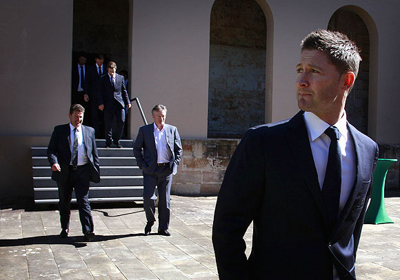 Current Australian cricket team captain Michael Clarke (rights) walks in front of former Australian team captains Mark Taylor (left) and Steve Waugh (2nd from right) before the start of a media conference in Sydney