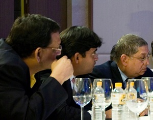 Narayanaswami Srinivasan (right), owner of Chennai Super Kings, with Guru Meiyappan (centre)