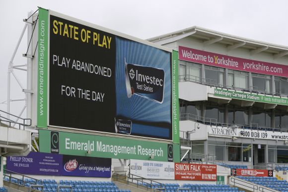 The scoreboard shows that play has been abandoned for the day at the second test cricket match between England and New Zealand at Headingley cricket ground