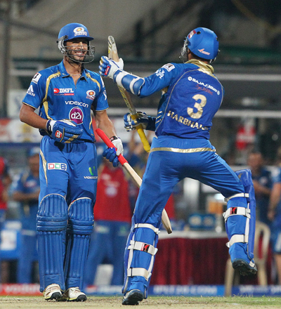 Harbhajan Singh and Rishi Dhawan celebrate Mumbai's win