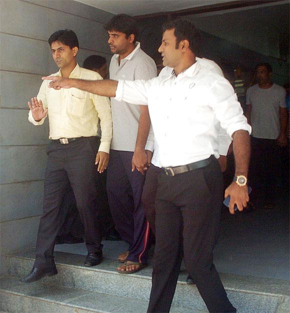 Gurunath Meiyappan, the former Chennai Super Kings CEO, centre, being produced in a Mumbai court, May 31.