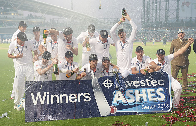 The England team celebrate their Ashes win in August this year