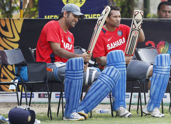 India's captain Mahendra Singh Dhoni (left) and Sachin Tendulkar
