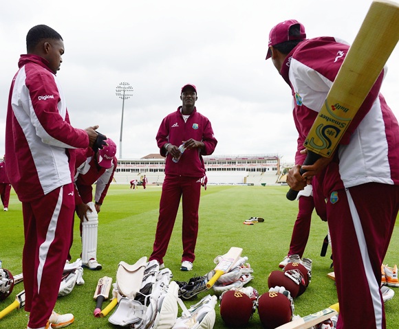 Captain Darren Sammy (centre) of the West Indies speaks to his players
