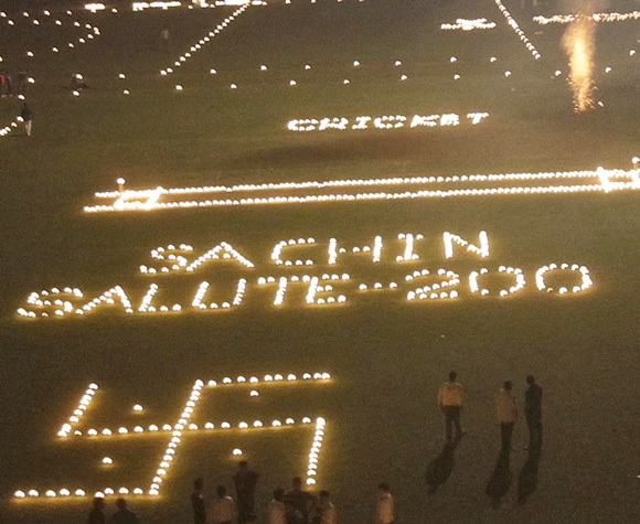 Candles spelling out a message about Indian cricketer Sachin Tendulkar