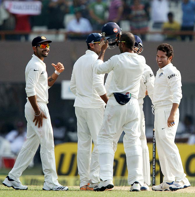 PHOTOS: Tendulkar gets a wicket in his 199th Test!