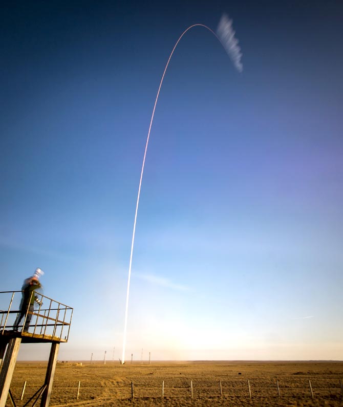 In this handout photo provided by NASA, The Soyuz TMA-11M rocket, in the two minute exposure during its launch