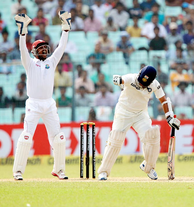 West Indies wicketkeeper Denesh Ramdin appeals for the wicket of Sachin Tendulkar