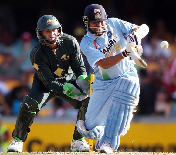 Sachin Tendulkar of India pulls the ball as Adam Gilchrist of Australia keeps wicket