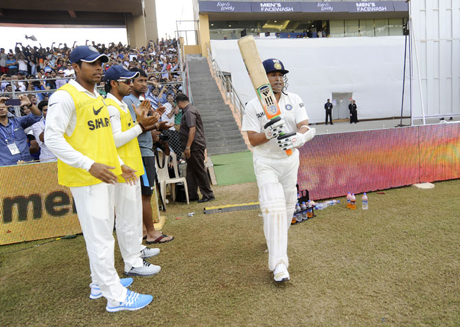 Sachin Tendulkar of India walks to bat 