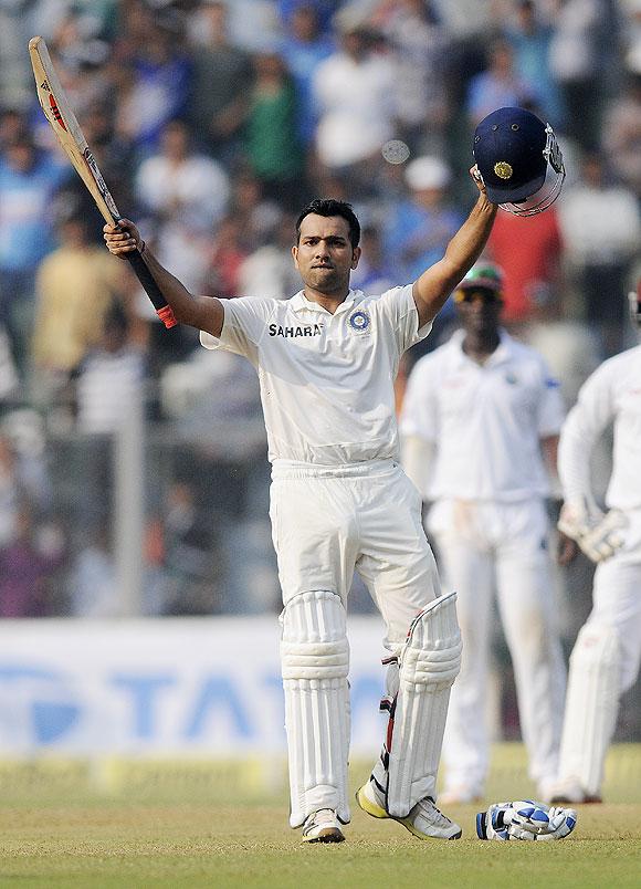 Rohit Sharma celebrates his century at the Wankhede on Friday