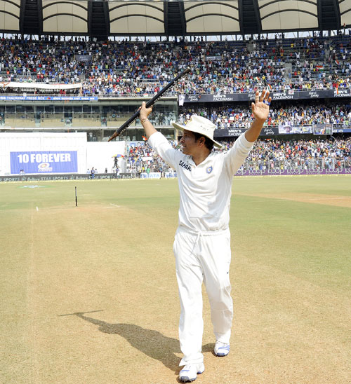 Sachin Tendulkar of India waves to the crowd at the end of the match