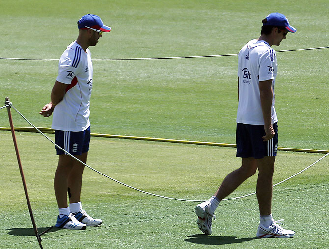 England captain Alastair Cook (right) and teammate Matt Prior during a training session at the Gabba cricket ground in Brisbane on Wednesday