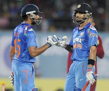 Rohit Sharma (left) and Virat Kohli compliment each other during the course of their innings