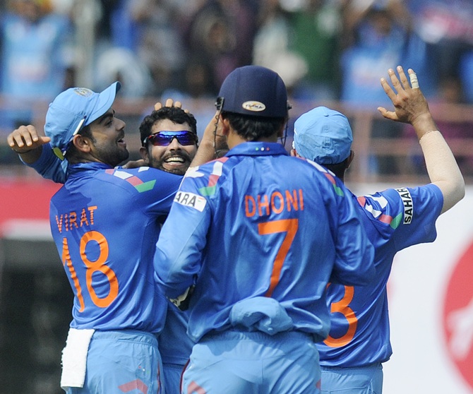 Ravindra Jadeja of India celebrates with teammates