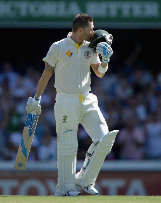 Michael Clarke reacts after reaching his century
