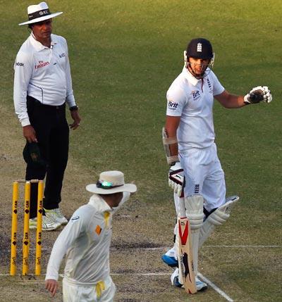 Michael Clarke and James Anderson exchange words