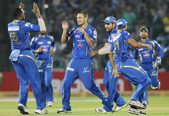 Mumbai Indians players celebrate a wicket