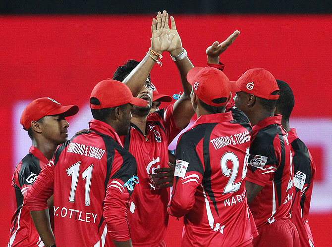 Ravi Rampaul celebrates a wicket with teammates