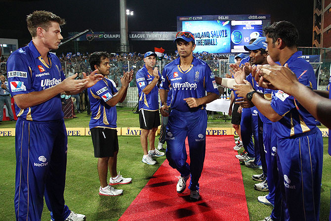 Rajasthan Royals captain Rahul Dravid walks through a Guard of Honour before the final of the Champions League T20 against Mumbai Indians on Sunday