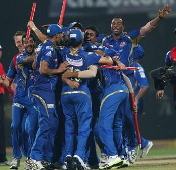 Mumbai Indians players celebrate victory