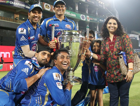 Mumbai Indians players celebrate with trophy after winning final